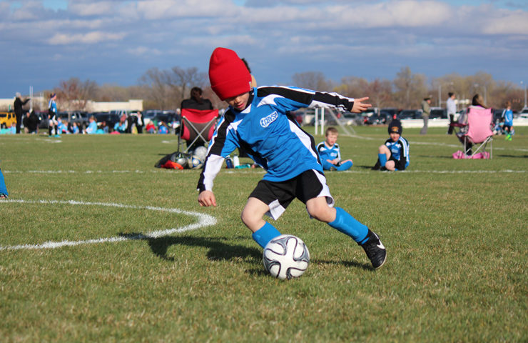 Hudson playing soccer